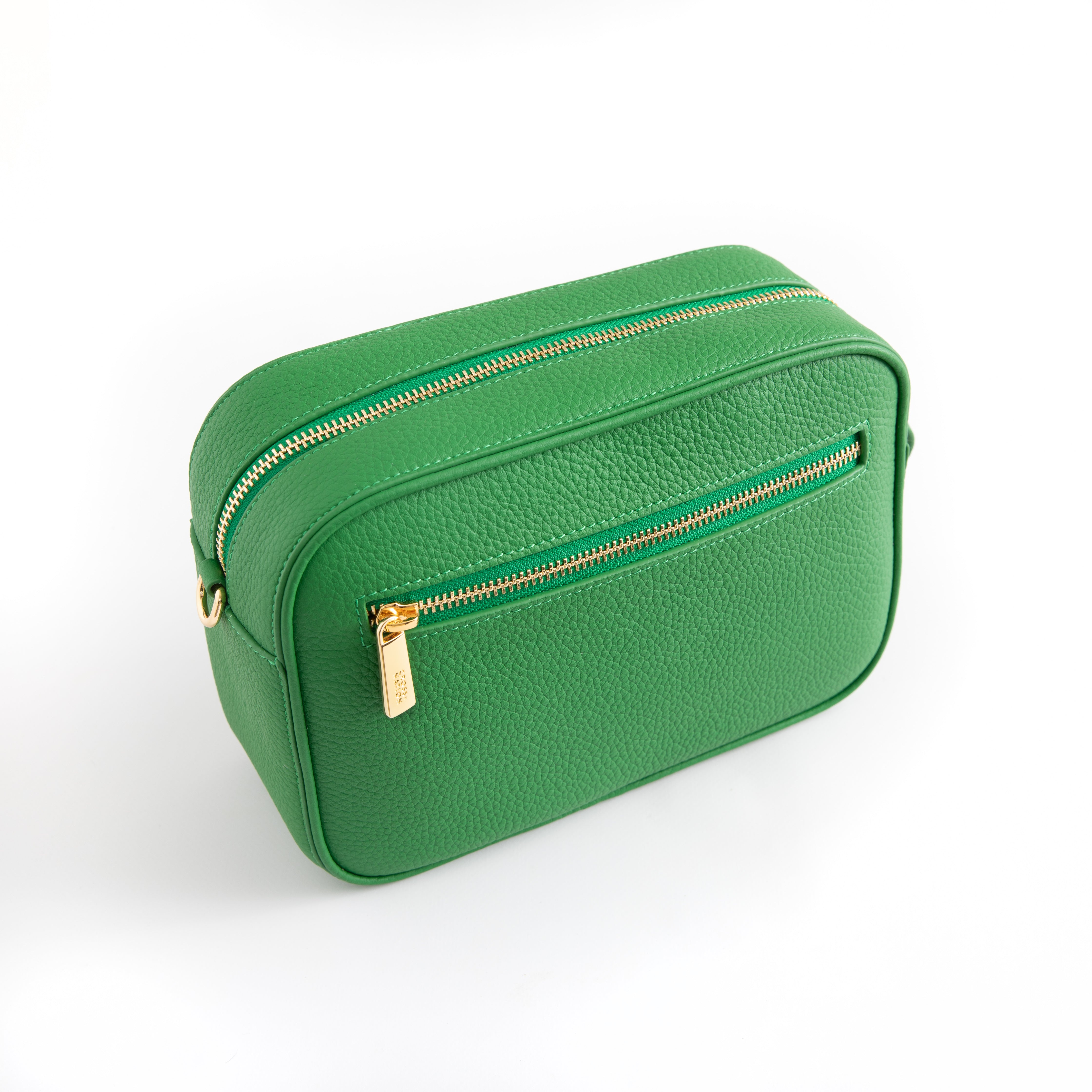 Green rectangular bag with gold zipper on a white background