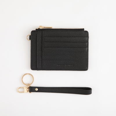 Black wallet with keychain on a white background